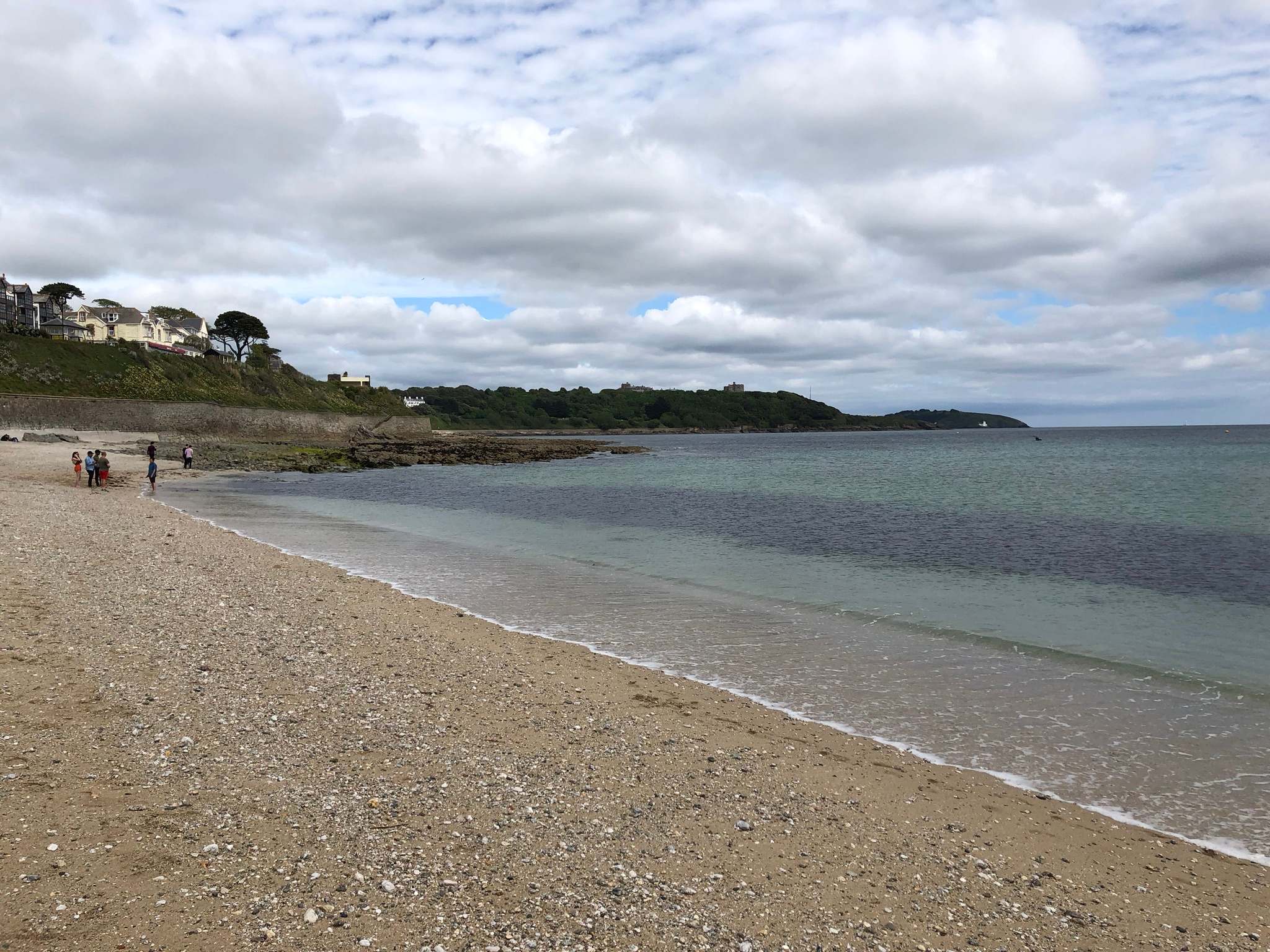 Gyllyngvase Beach at Falmouth — south-facing, Blue Flag, with Pendennis Castle on the headland.