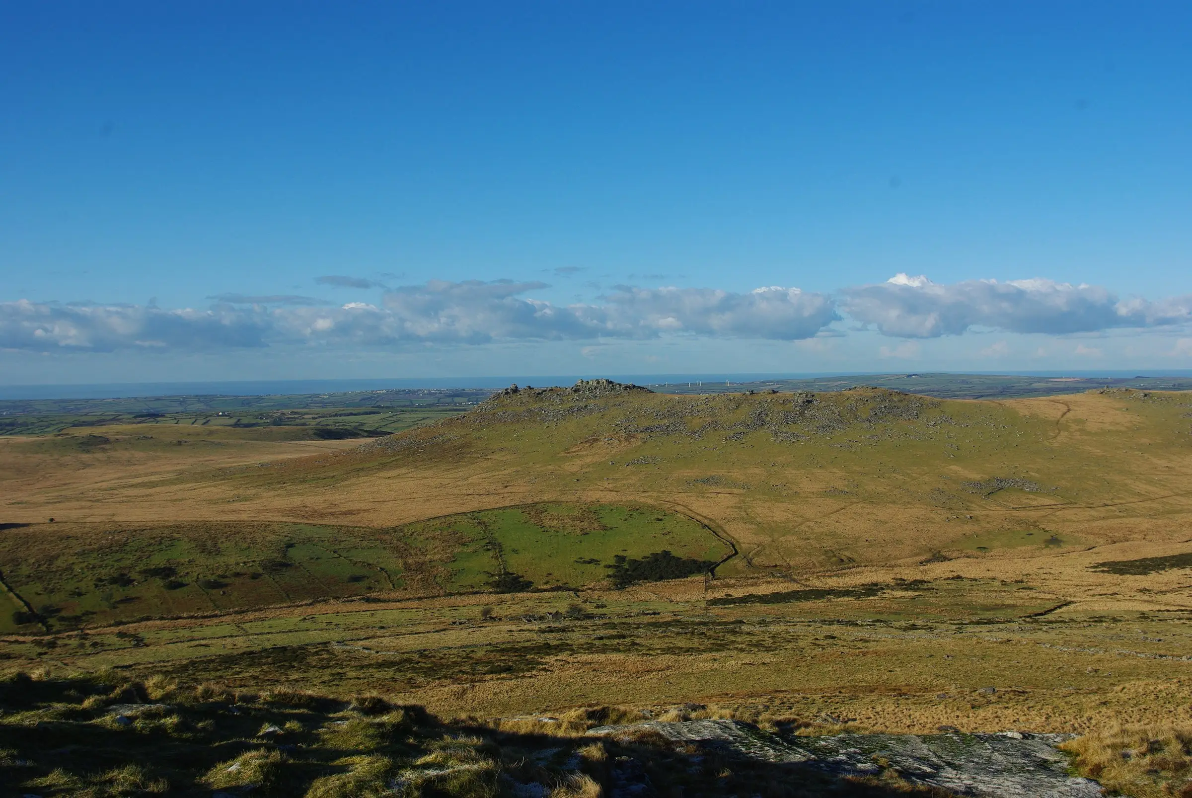 Bodmin Moor — open moorland and granite tors under a dramatic sky.