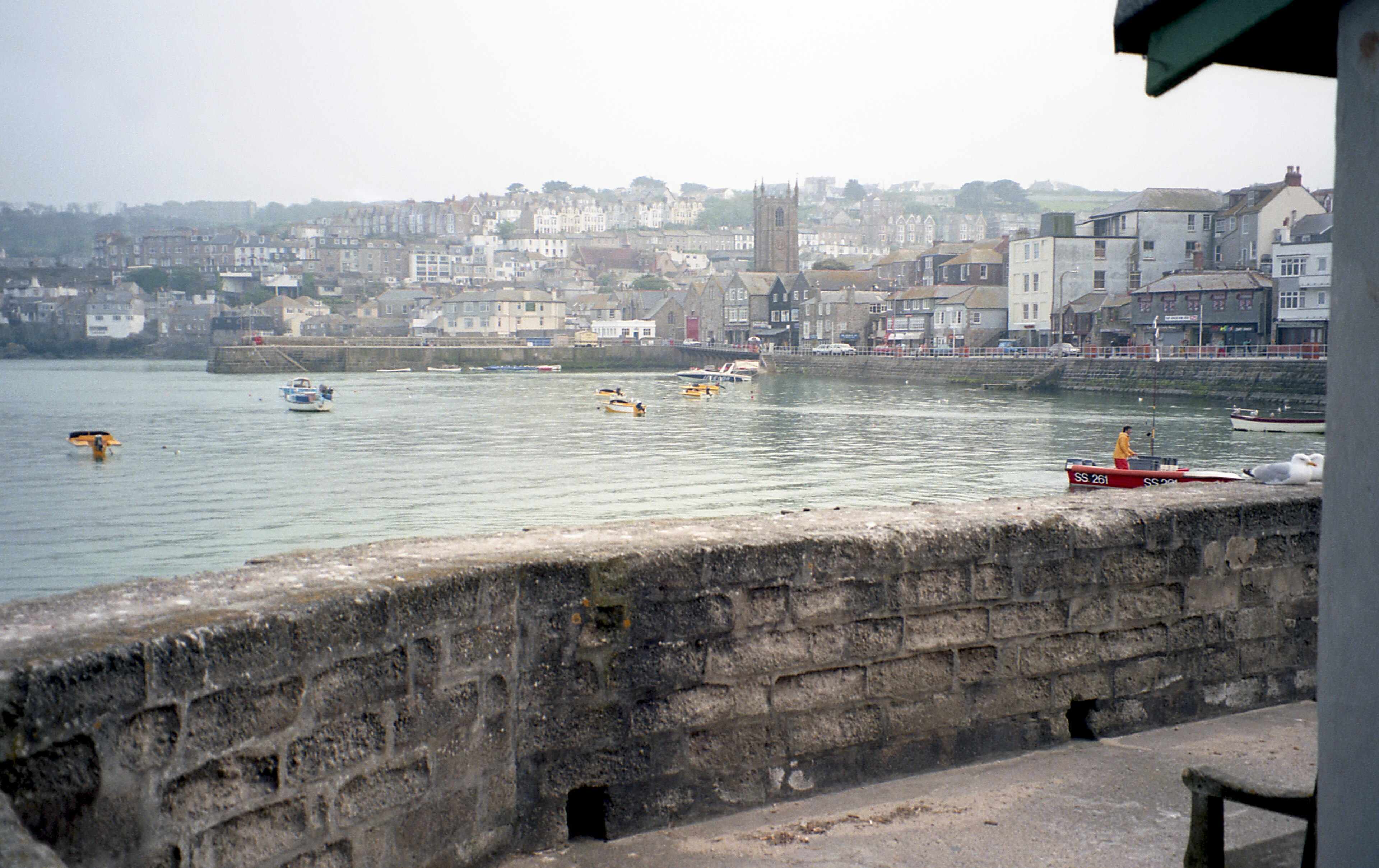 St Ives from above — the harbour curving north-east, Porthmeor open to the Atlantic, and the town clustered on its small peninsula.