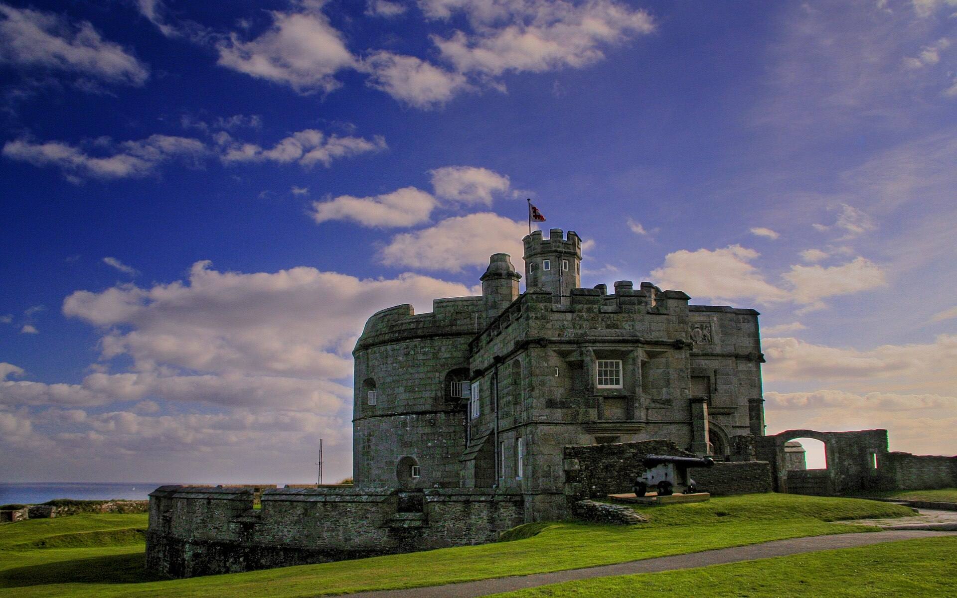 Pendennis Castle on its headland above Falmouth in low cloud — the Tudor fortress that anchors the working harbour.