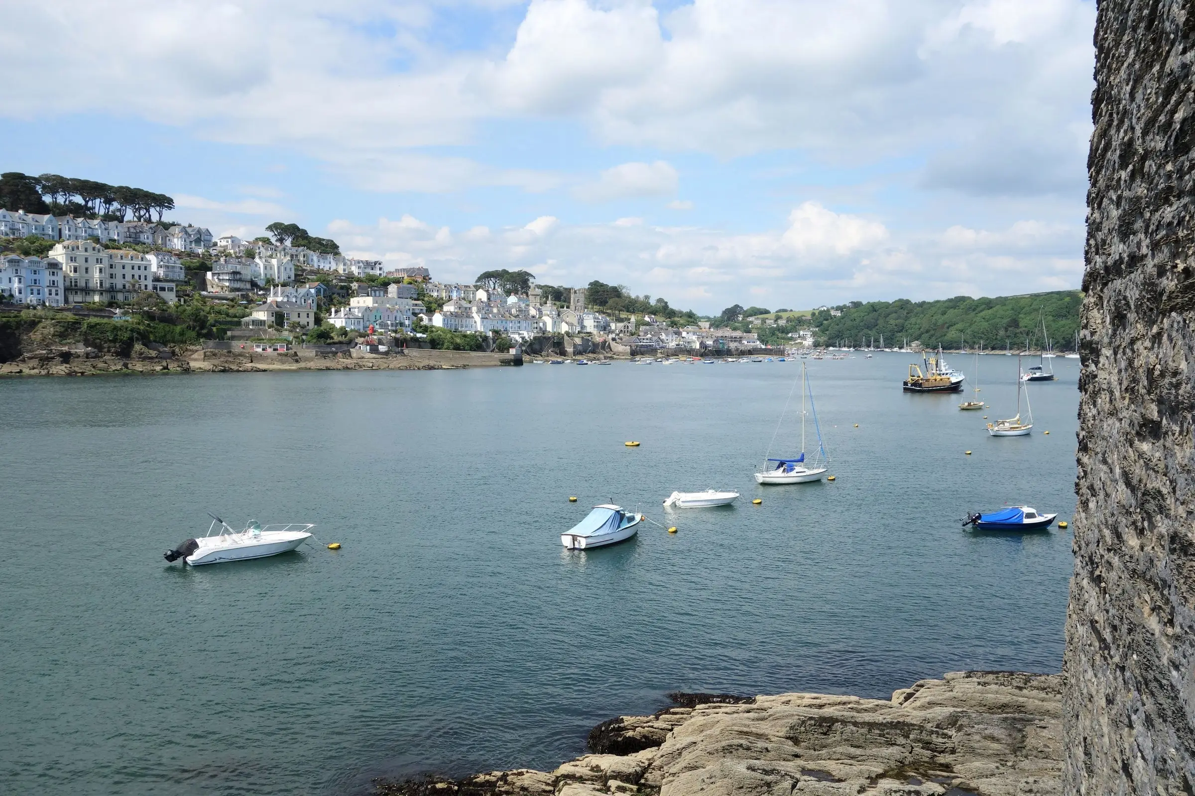 The Fowey estuary — wooded creek banks and the river opening toward the sea.
